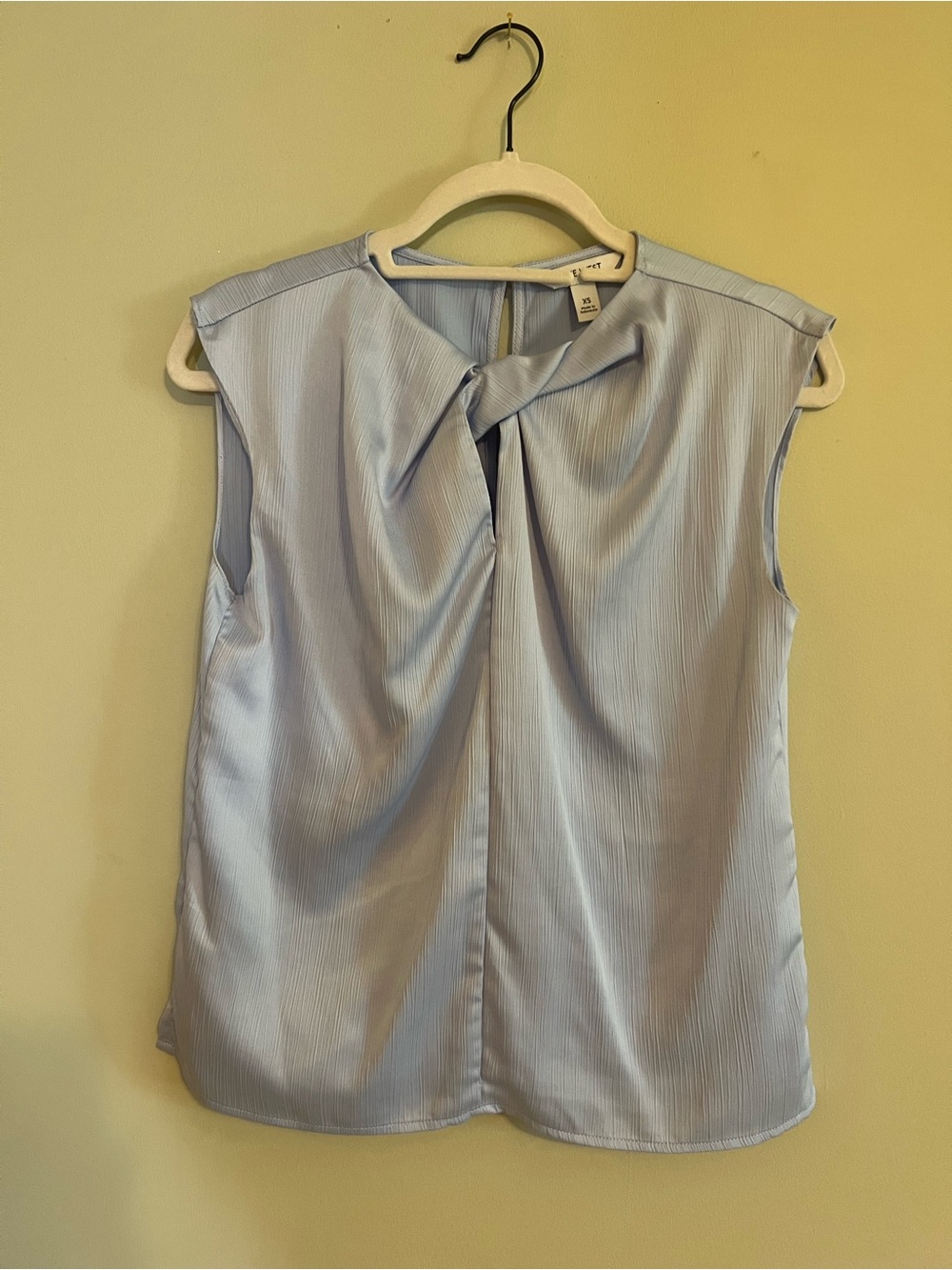 Nine West sleeveless top. Size XS. Color light blue.